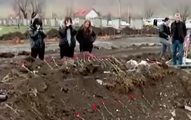 Övladları Xocalıda qalıqları tapılan qadının basdırıldığı yerdə