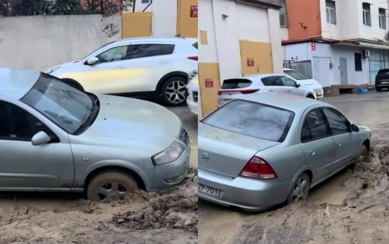 Bakıda binanın həyəti çökdü, maşın çuxura düşdü